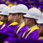 ECU College of Engineering and Technology graduates wear their hard hats during the commencement ceremony